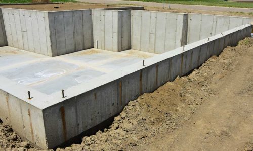 homeguide-concrete-basement-foundation-poured-and-ready-for-lumber